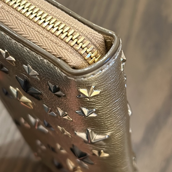 BRAND NEW Jimmy Choo London metallic grainy leather with stars wallet brand NEW